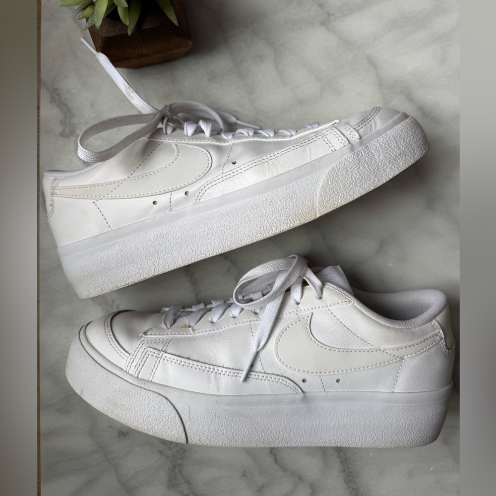 Nike Women's Blazer Low Platform sneakers in the "Triple White" colorway